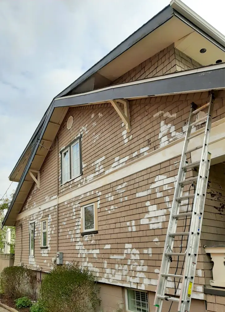 Exterior painting preparation on a Calgary home