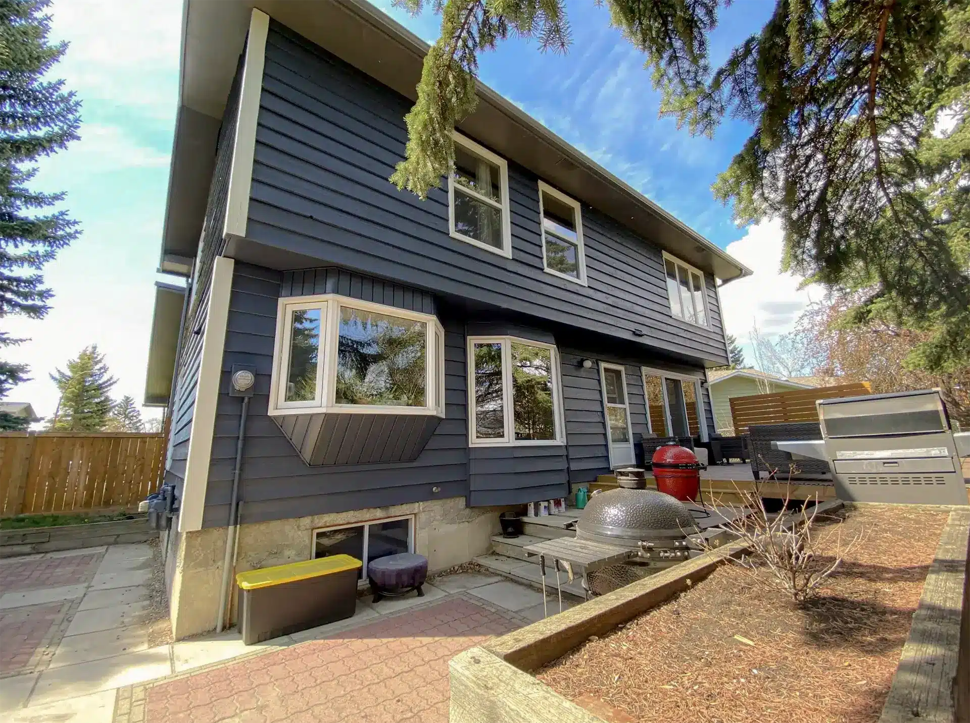 Repainted siding on a two-storey Calgary home