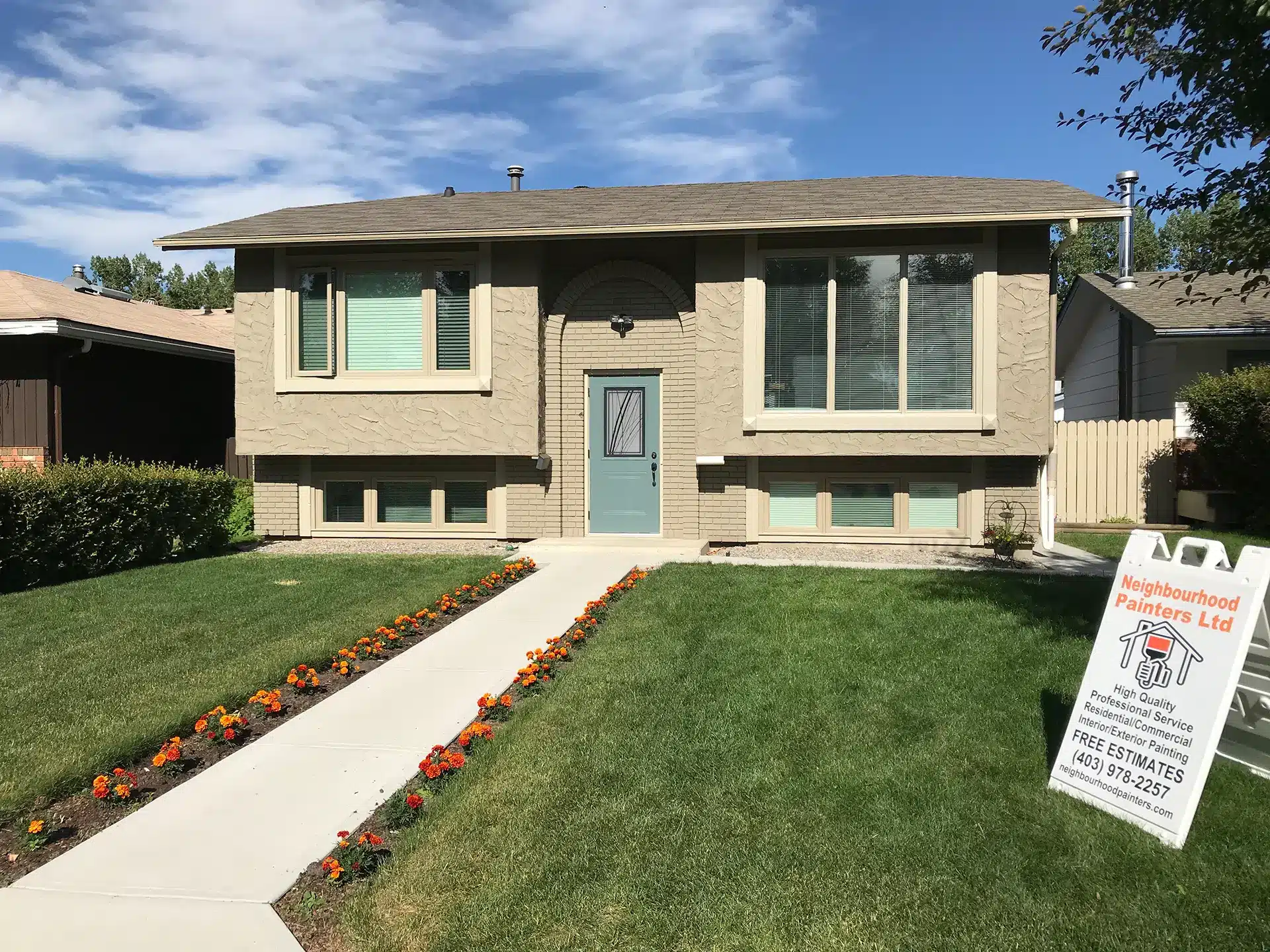 Cream bi-level repainted in Calgary